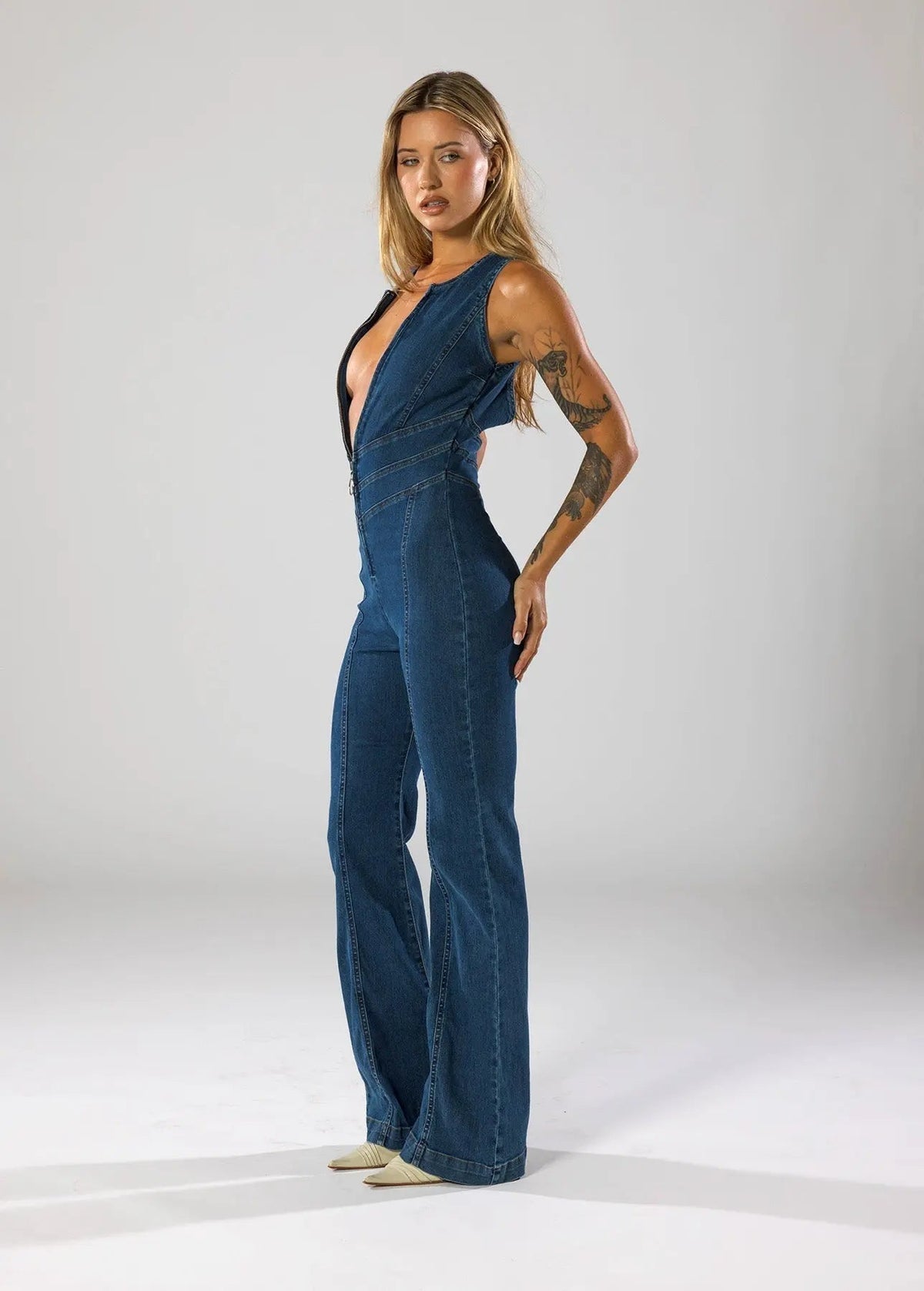 Women's Denim Jumpsuit with V Neckline and Flared Leg