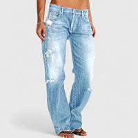 Women's Straight Leg Jeans with Distressed Detail and Mid Rise